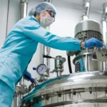 Scientists Working In Large Cosmetic Lab